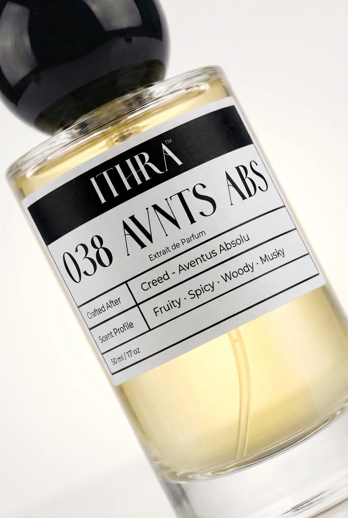 Close-up of 038 AVNTS ABS perfume by Ithra, fruity spicy woody musky, available in 50ml and 100ml
