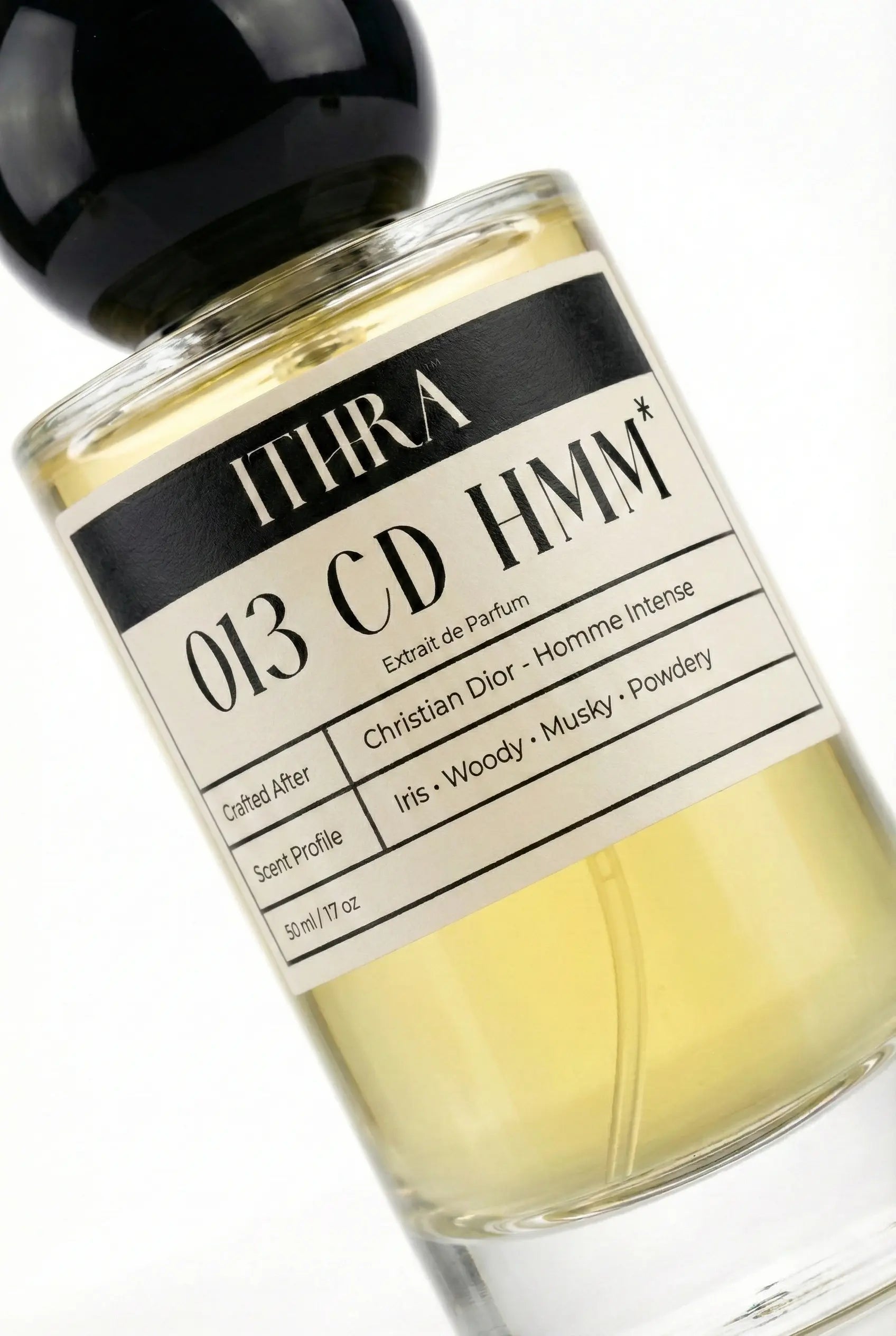 Close-up of 013 CD HMM perfume by Ithra, iris woody musky powdery extrait de parfum available in 50ml and 100ml
