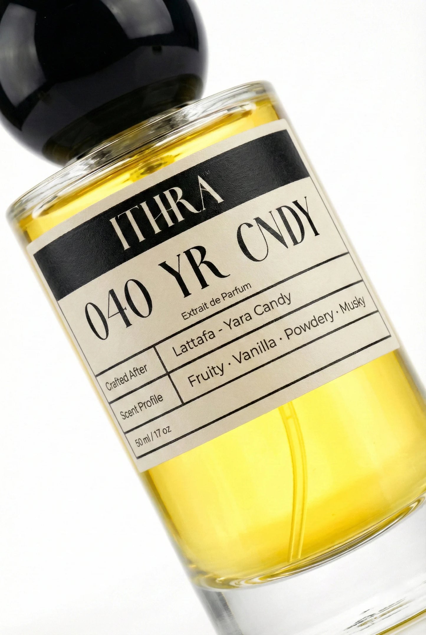 Close-up of 040 YR CNDY perfume by Ithra, fruity vanilla powdery musky perfume, available in 50ml and 100ml