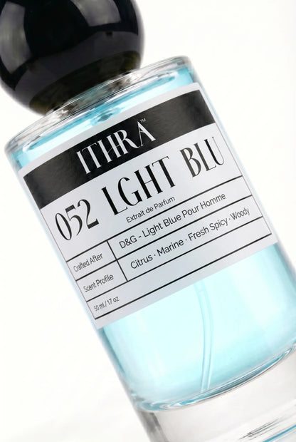 Close-up of 052 LGHT BLU perfume label by Ithra Perfumes, citrus aquatic fresh spicy woody, available in 50ml and 100ml