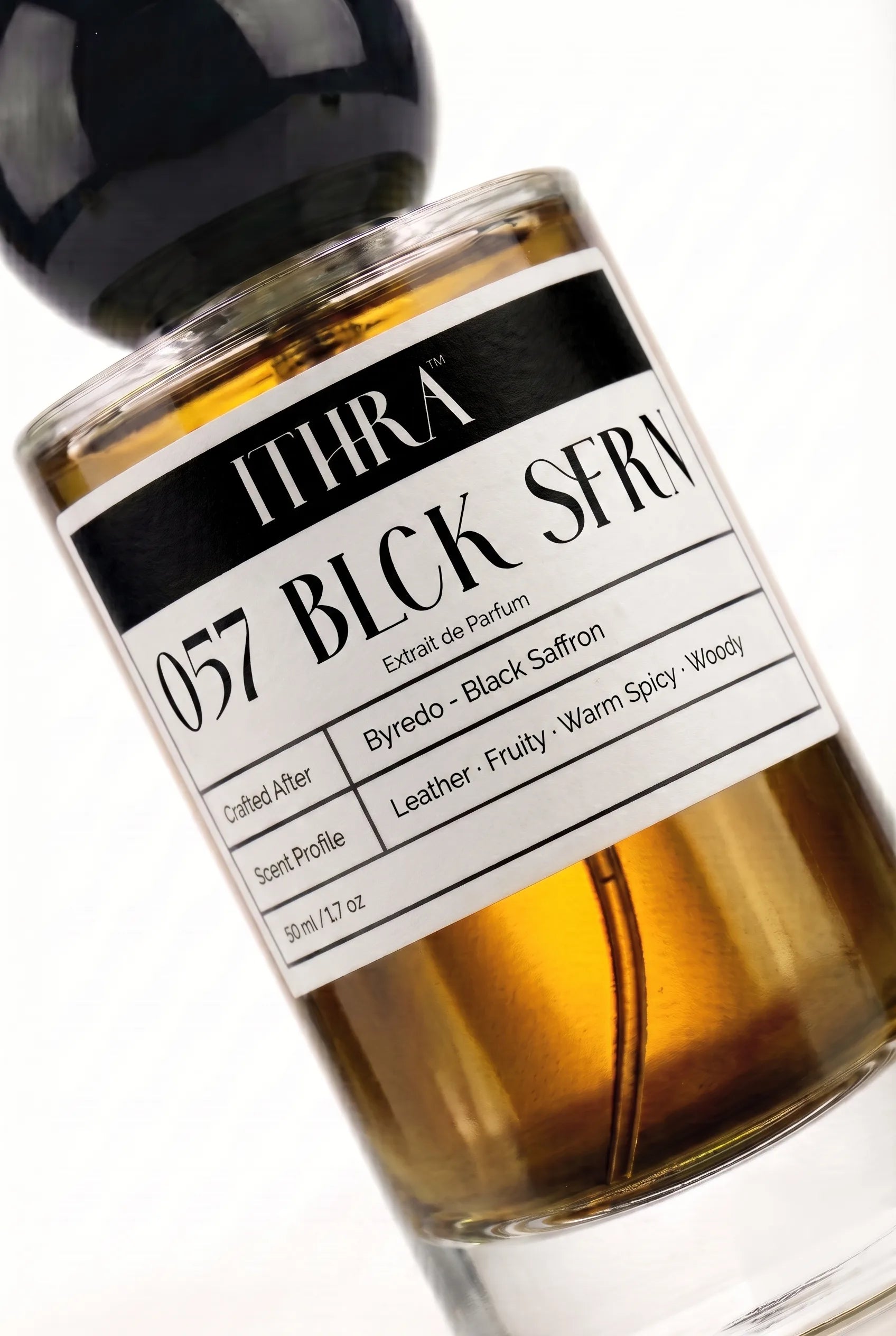 Close-up of 057 BLCK SFRN perfume by Ithra, leather saffron fruity warm spicy woody, available in 50ml and 100ml
