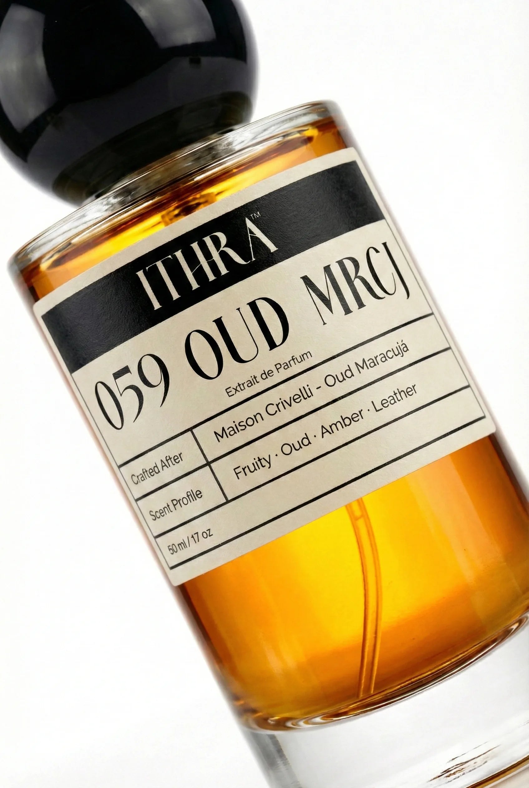 Close-up of 059 OUD MRCJ perfume label by Ithra Perfumes,  fruity oud amber leathery fragrance, available in 50ml and 100ml
