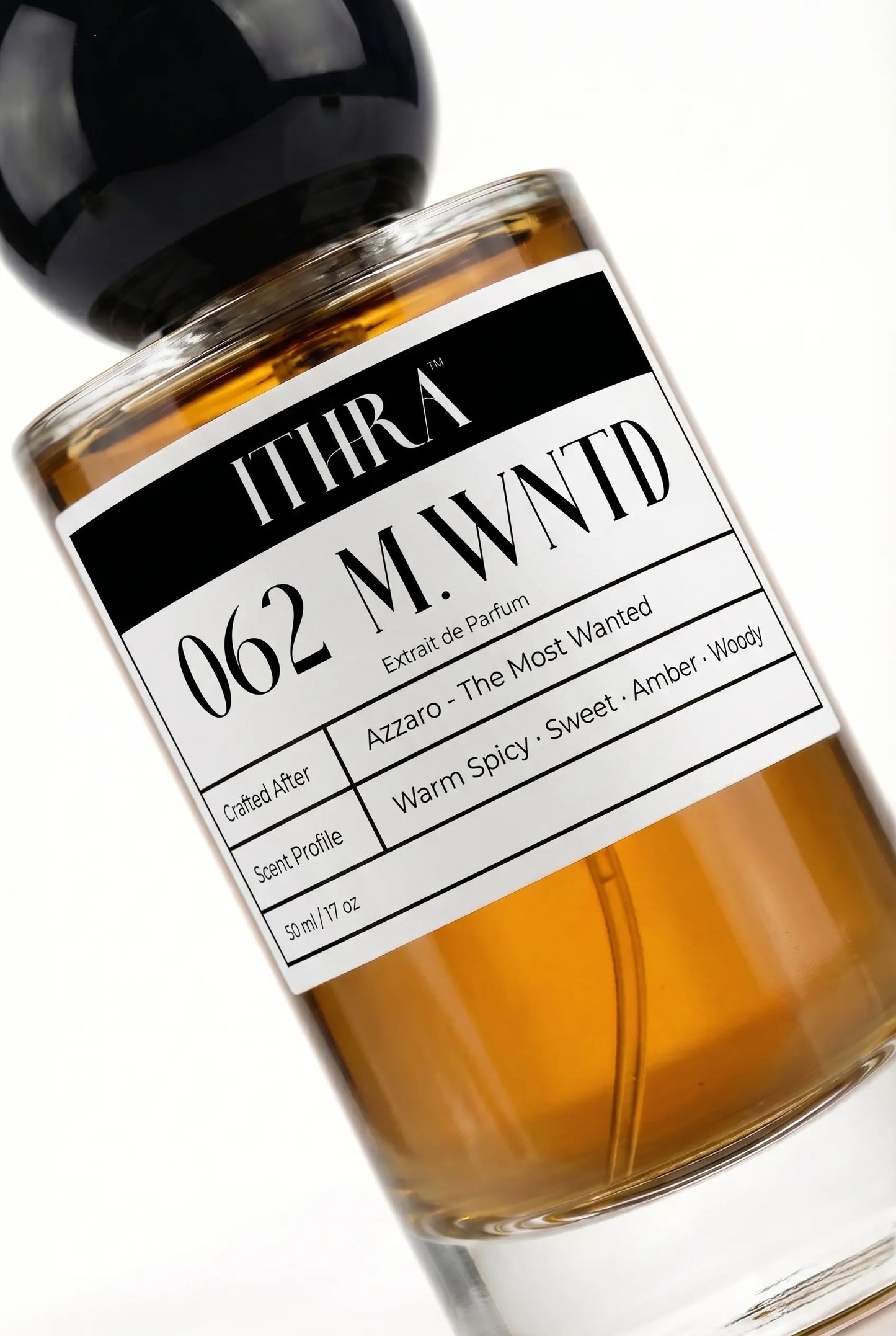 Close-up of 062 M.WNTD by Ithra Perfumes, amber sweet warm spicy woody, available in 50ml and 100ml