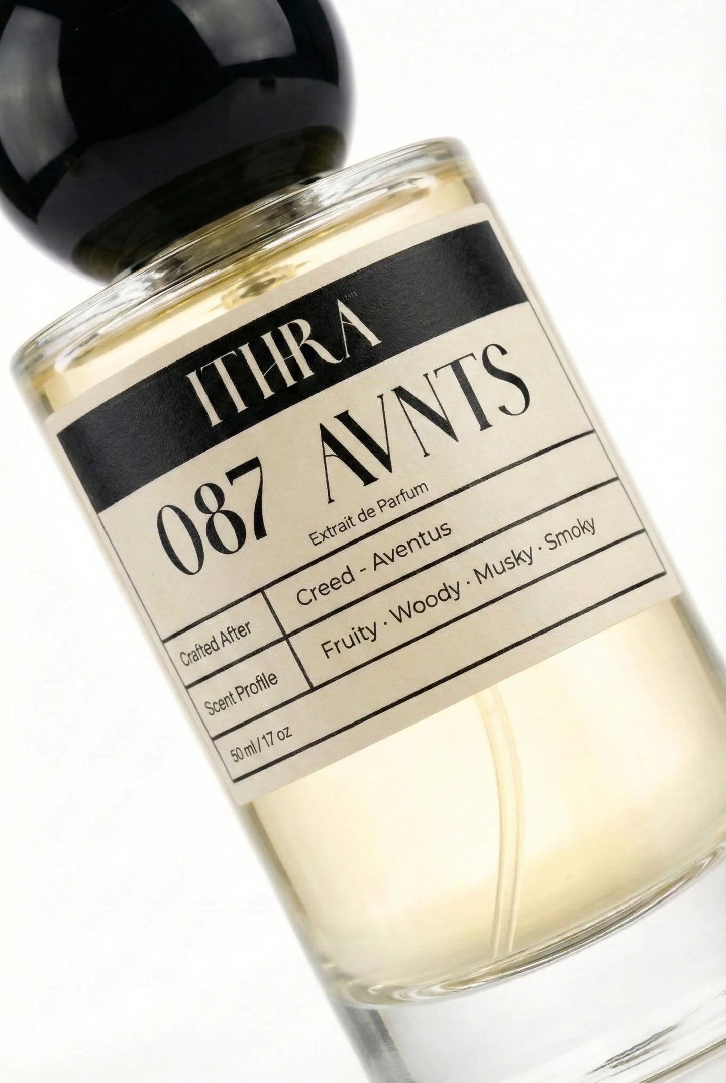 Close-up of 087 AVNTS perfume by Ithra Perfumes, chypre fruity woody smoky perfume, available in 50ml and 100ml