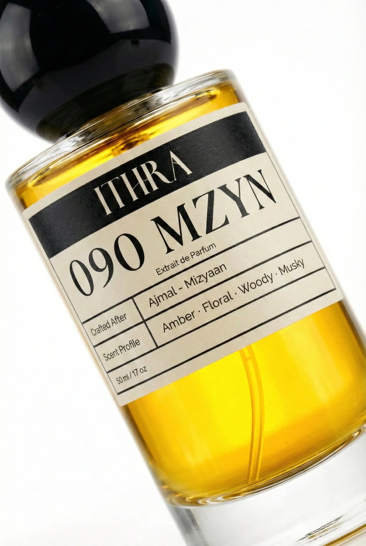 Close-up of 090 MZYN perfume by Ithra Perfumes, oriental floral amber woody musky perfume, available in 50ml and 100ml