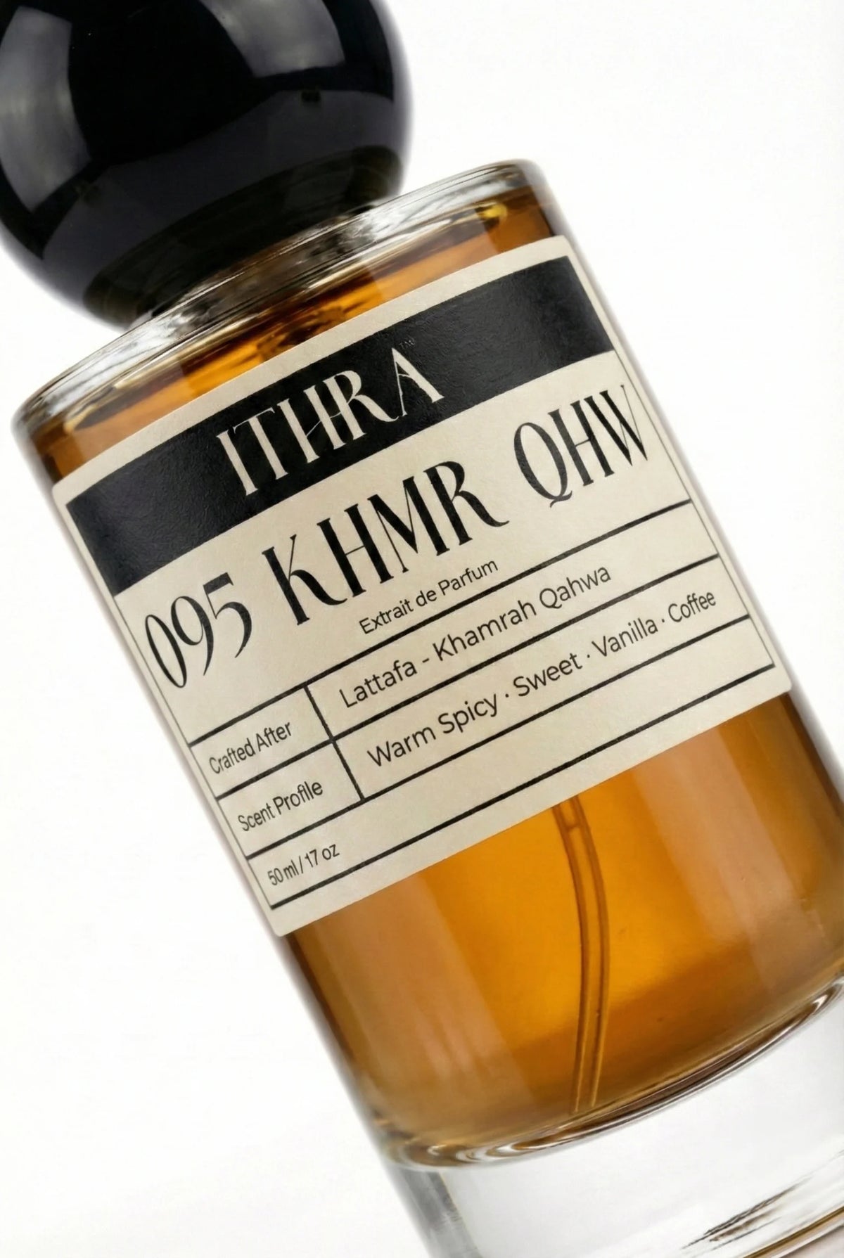 Close-up of 095 KHMR QHW perfume by Ithra, warm spicy coffee vanilla sweet unisex perfume, available in 50ml and 100ml