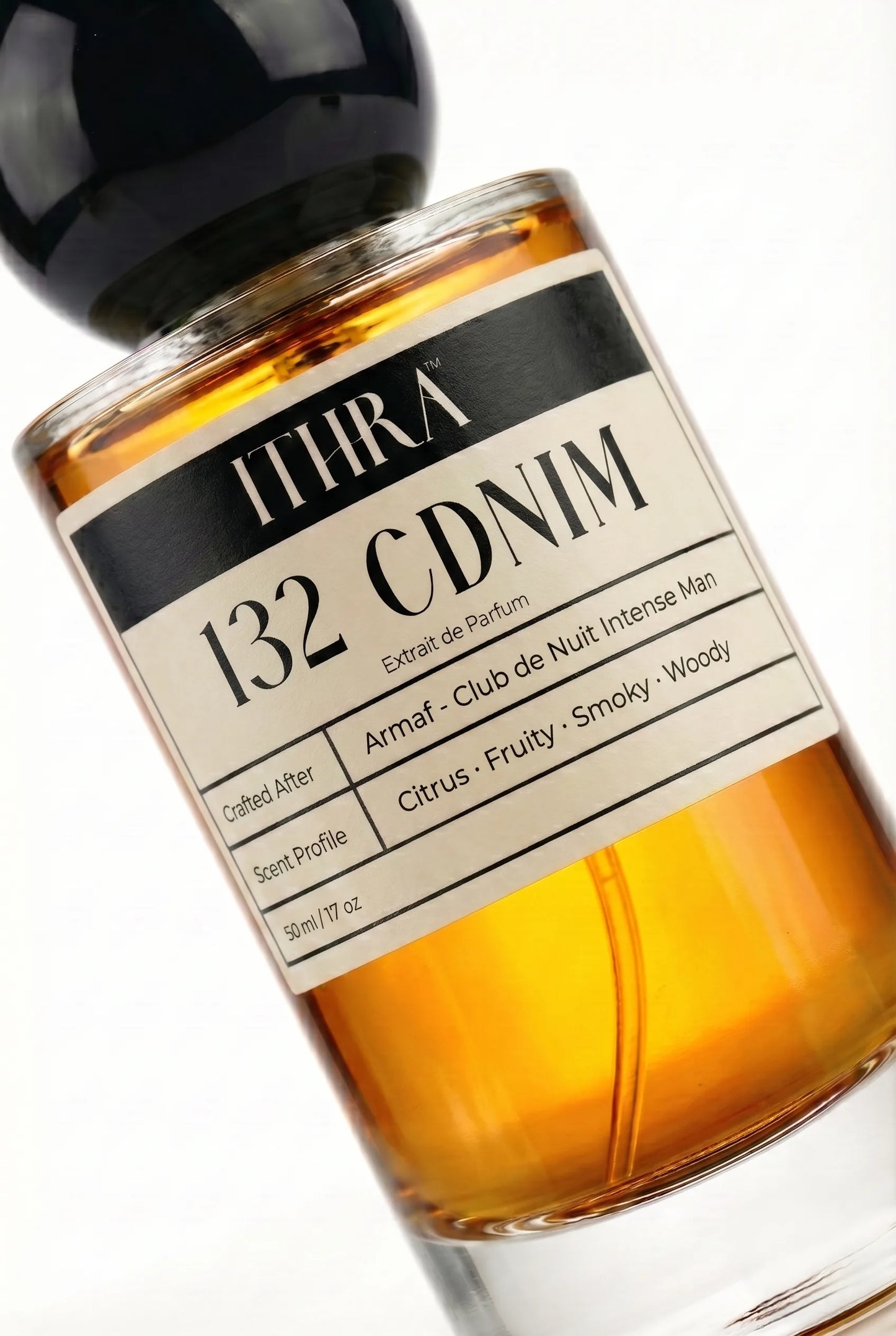 Close-up of 132 CDNIM perfume by Ithra, citrus fruity smoky woody, available in 50ml and 100ml