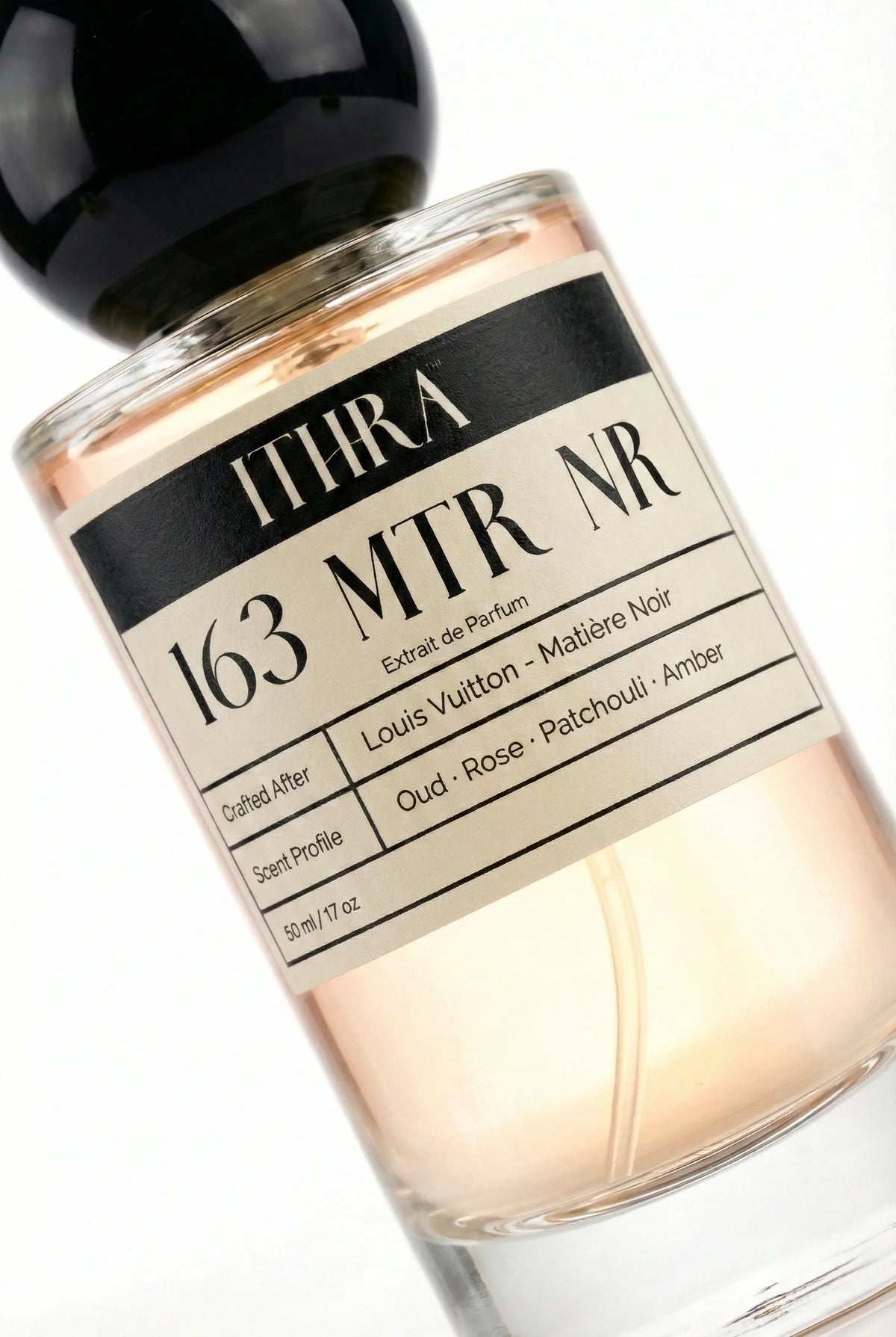 Close-up of 163 MTR NR perfume label by Ithra Perfumes, musk rose patchouli oud amber women's perfume, available in 50ml and 100ml