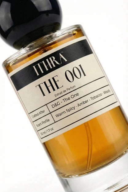 Close-up of THE 001 perfume by Ithra, amber tobacco warm spicy woody, available in 50ml and 100ml